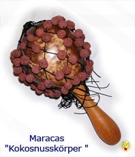    Maracas Kokosnuss Netz  25 cm 
 Kokosnuss gefüllt mit Körner, 
und mit einem Holzgriff 
zusätzlich mit einem Netz mit Rudraksha Samenkörner. 
 Gesamtlänge ca. 25 cm 
 Handwerkskunst aus Indonesien  erhältlich'im'Kristallzentrum    